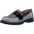 A single women's slip-on loafer with a black and silver houndstooth patterned upper, a wide black strap with silver studs, and a chunky black platform sole.