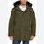 An olive green hooded parka jacket with black faux-fur trim on the hood, worn by a model over a white t-shirt and blue jeans against a light gray background.