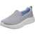A light gray knit slip-on sneaker with a white sole and a small teal accent on the heel pull tab, shown against a plain white background.