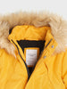 Yellow jacket with fur hood and brand label on a white background