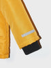 Close-up of a yellow jacket sleeve with a reflective strip on a white background