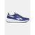 A Reebok athletic sneaker in a deep periwinkle blue color with white accents, including the brand name, the iconic side stripe, and the midsole, shown against a light gray background.
