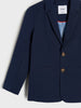 Navy blazer with gold buttons on a white background