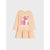 A girls' long-sleeve dress in a light peach-pink color, featuring a Barbie-themed graphic print on the front with two cartoon-style Barbie figures and the word 'Barbie' in white script. The dress has a ruffled hem and is shown against a light gray background.