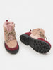 Pair of children's boots with pink fur lining on a white background
