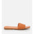 A single flat slide sandal with a woven tan leather strap and a matching tan footbed, shown in profile against a light gray background.