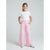 A young girl stands against a light gray studio background wearing a white short-sleeve t-shirt and light pink wide-leg trousers, paired with white sneakers.