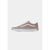 A single Vans Old Skool sneaker in a light taupe-beige suede, featuring a white side stripe, white laces, and a white rubber sole with a thin black stripe.