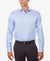 Man wearing a light blue dress shirt and dark pants on a white background