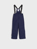 Navy blue bib overalls on a white background