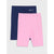 Two pairs of children's athletic shorts stacked together on a light gray background. The front pair is light pink with a small white logo, and the pair behind it is navy blue with a matching white logo.