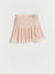 Pink skirt with floral detail on a white background
