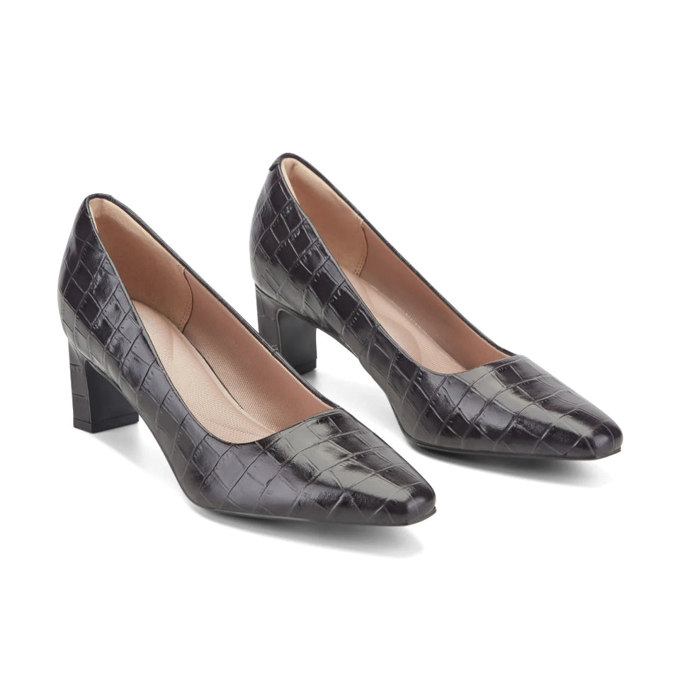 Pair of black crocodile-patterned high-heeled shoes on a white background