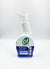 Cif Bathroom Limescale cleaning spray bottle held by a hand on a stone surface