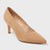 A single women's pointed-toe pump in light tan suede or nubuck, shown from a three-quarters angle on a light gray studio background.