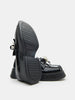 Black dress shoes with a white background