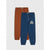 Two pairs of kids' jogger sweatpants, one in rust orange and one in navy blue, displayed flat against a light gray background. The navy pair features white text reading 'NO MORE RULES' on the left thigh.