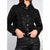 A woman wearing a black sequined jacket with a stand-up collar and front buttons, paired with black pants, shown against a plain light gray background.