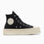 A black high-top canvas sneaker with a chunky off-white platform sole, featuring a circular off-white Converse star patch on the side and silver eyelets, shown against a plain white background.