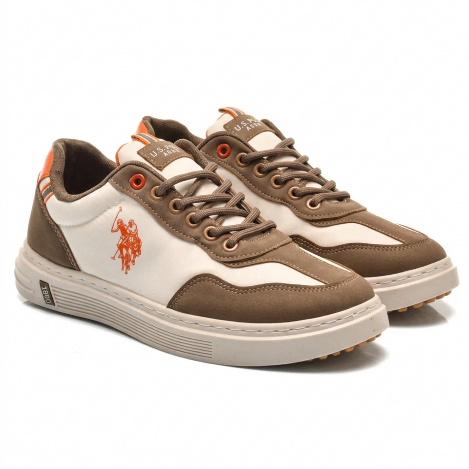 A pair of Polo Ralph Lauren sneakers in brown, white, and orange. The shoes feature a white and brown leather upper with orange accents, including the signature polo player logo on the side and orange eyelets, set against a plain white background.
