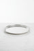 Silver round tray on a white background