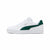A Puma low-top sneaker in white with a dark green side stripe and heel tab, shown from a side profile on a light gray background.