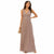 A woman modeling a sleeveless, floor-length mauve-pink sequined gown with a V-neckline and gathered waist, holding a small beige clutch against a plain white background.