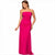 A woman modeling a bright hot pink strapless mermaid gown with ruched detailing on the bodice and a flowing sheer mesh skirt, set against a plain white background.
