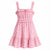 A pink floral print sleeveless dress with ruffled straps, a smocked bodice, and tiered skirt, shown against a plain white background.