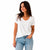 Woman wearing a white t-shirt and blue jeans on a white background