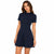Woman wearing a navy blue dress on a white background