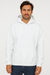 Man wearing a white hoodie on a plain background