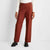 Brown pants worn by a person on a white background