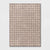 Rectangular rug with a grid pattern on a light gray background