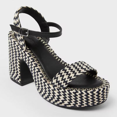 Black and white houndstooth patterned sandal on a white background
