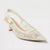 An off-white pointed-toe slingback kitten heel shoe with a textured lace overlay and a beige block heel, shown against a plain white background.