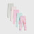 Five pairs of children's leggings in pastel colors, arranged in a fan shape on a light gray background. The leggings feature various patterns including solid gray, white polka dots, solid pink, light blue with small motifs, and a pink unicorn print.