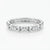 A polished silver eternity band ring with a textured, beaded exterior and a smooth, scalloped interior, shown on a clean white background.