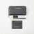 A black quilted leather wallet set with a wristlet strap and card holder, both featuring gold-tone 'bebe los angeles' branding, displayed on a clean white background.