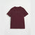 A short-sleeve crewneck t-shirt in maroon with the text 'ALL YOU NEED IS.