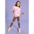 A young girl modeling a pink long-sleeve sweatshirt with a colorful cupcake graphic, paired with brown leggings featuring bunny patches on the knees, and light pink sneakers, set against a solid lavender studio background.