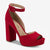 A red suede platform sandal with a high block heel, open toe, and ankle strap, shown from a three-quarters angle on a light gray background.