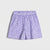 A pair of girls' shorts featuring a purple and white floral print, displayed flat against a light gray background.