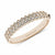 A rose gold eternity ring featuring a double row of pavรฉ-set clear diamonds, with the brand name 'MARCHESA' engraved on the inner band, set against a clean white background.