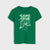 A green short-sleeve t-shirt with a distressed light green graphic on the front featuring the text 'GAME OVER' and a video game controller, displayed on a light gray background.