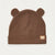 A brown ribbed knit baby beanie hat with small bear ears on top and a small embroidered bear face patch on the cuff, shown against a plain white background.