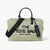 Marc Jacobs 'The Tote Bag' in a pale mint green faux fur material, featuring black leather handles, a black shoulder strap, and black printed text on the front.