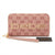 A pink zip-around wallet with an allover tonal monogram pattern, featuring a large gold-tone 'bebe' logo on the front, a matching wristlet strap, and a black brand tag.