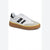 A low-top platform sneaker by JUMP, featuring a white leather and light beige suede upper, a black three-stripe design on the side, a brown gum sole, and a thin yellow stripe above the sole.
