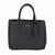 A black tote bag with a gold polka dot pattern, featuring dual top handles, a hanging leather tag, and the brand name 'bebe' printed in gold on the front.